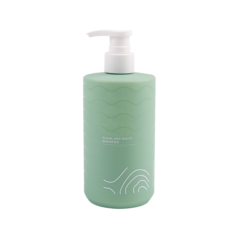 Groene plastic pershampoo fles