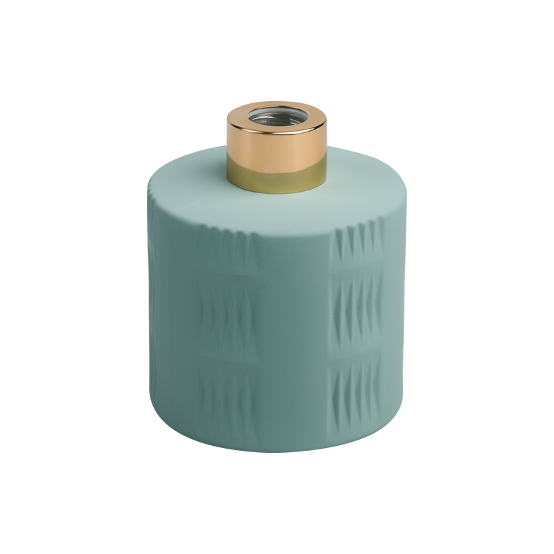Aqua groene geurfles met gouden dop
