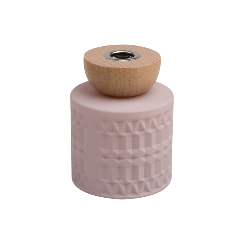 Geometrische patroon roze geurpot met houten dop